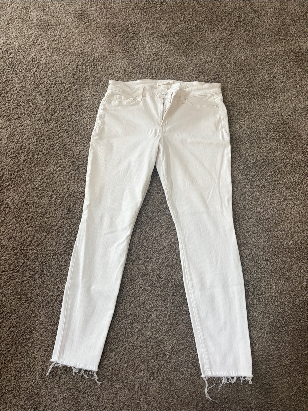 Joe's Jeans White Skinny Ankle Jeans with Zip Fly and Ankle Fringe